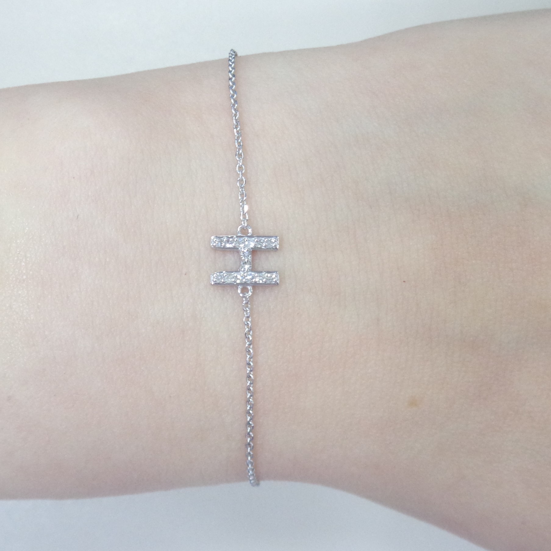 Браслет из белого золота с бриллиантами "Н"